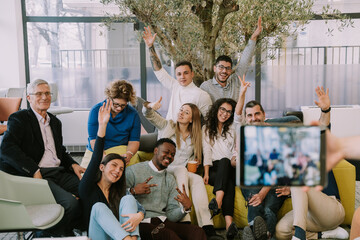 Happy diverse coworkers posing for picture