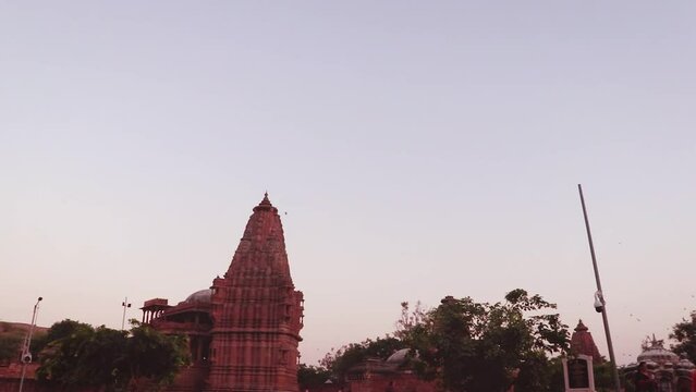 red stone ancient hindu temple architecture from unique angle at day
