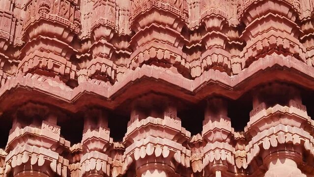 red stone ancient hindu temple architecture from unique angle at day