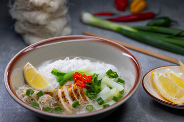 pho soup with chicken meat and vegetables