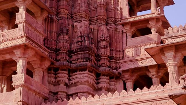 red stone ancient hindu temple architecture from unique angle at day
