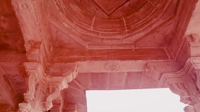 red stone ancient hindu temple architecture from unique angle at day