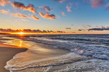 Sonnenuntergang am Strand der Ostsee - obrazy, fototapety, plakaty
