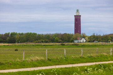 Fototapeta na wymiar Westhoofd lighthouse (Vuurtoren Westhoofd) near Ouddorp, The Netherlands