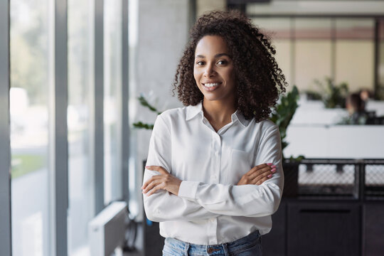 Smiling Young Businesswoman Portrait, Self Confident Young Woman With Crossed Arms At Office, People, Candid Portraits, Business Casual, Self Confidence, Leadership Concepts