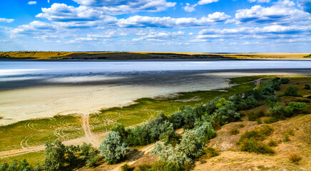 Natural landscape of the south of Ukraine, View of the drying Kuyalnitsky estuary with rose water, in which Artemia salina and Dunaliella algae live