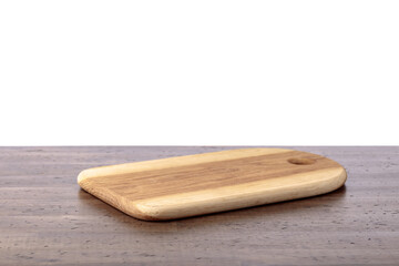 Cutting board on an old wooden table.