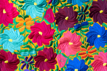Hand-beaded floral art in Chiapas, colorful flowers sewn with care and passion Mexican handicrafts