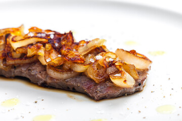 steak covered by caramelized onion