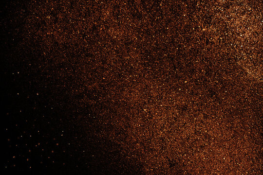 Black dark orange red brown shiny glitter abstract background with space. Twinkling glow stars effect. Fantastic, fantasy. Like outer space, night sky, universe. Rusty, rough surface, grain.