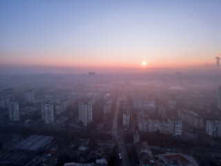 Fototapeta na wymiar Cold and foggy sunrise over the Sofia(Bulgaria) city