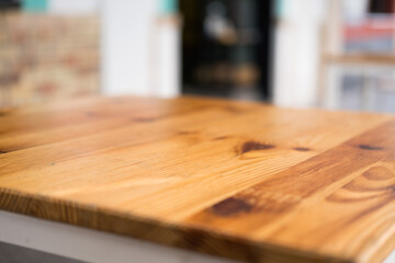 Fototapeta na wymiar Empty wooden table on a restaurant terrace.