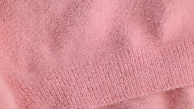 Close up of soft pink angora cloth, textile detail in pastel colors