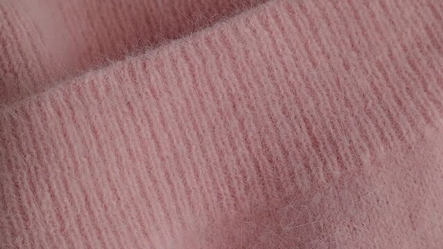 Close up of soft pink angora cloth, textile detail in pastel colors