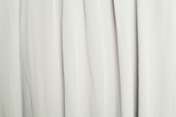 Obraz premium White silk smooth background. Fabric satin texture.