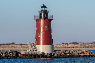 The Delaware Breakwater East End Light is a lighthouse located on the inner Delaware Breakwater in the Delaware Bay, just off the coast of Cape Henlopen and the town of Lewes, Delaware. - obrazy, fototapety, plakaty