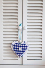 Fabric Heart Hanging From Cabinet - 575365400