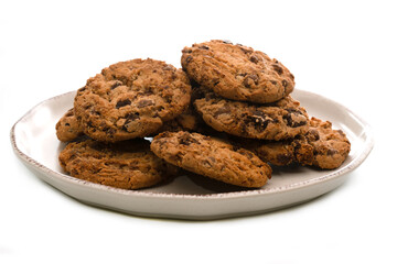 Chocolate chip cookies on a plate on white background