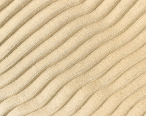 Fototapeta na wymiar Sand. Texture, surface of sea sand. Natural background. Close-up. Waves of sand. Dunes. Copy space