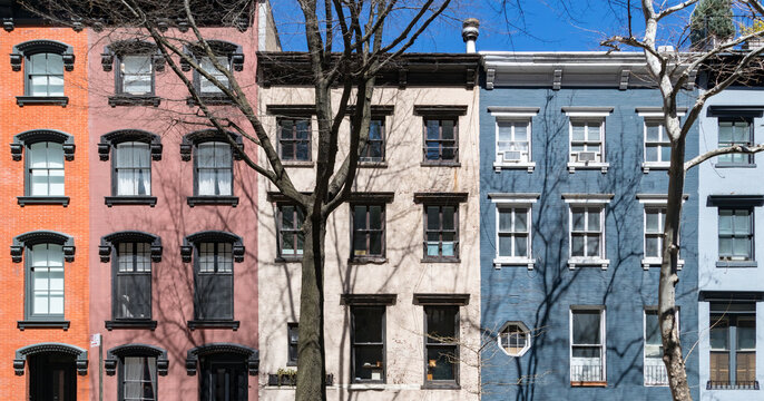 Block of colorful old apartment buildings on 18th Street in the Gramercy Park neighborhood of New York City