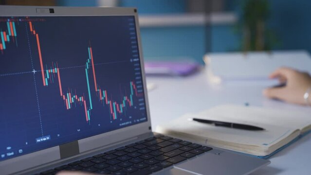 Thoughtful hands analyzing charts in stock market. Analyze.
Man analyzing financial data stock market price, checking online trading platform app.
