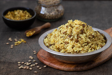 Obraz na płótnie Canvas Mujadara - lentils and rice pilaf with fried onion. Middle eastern cuisine recipe