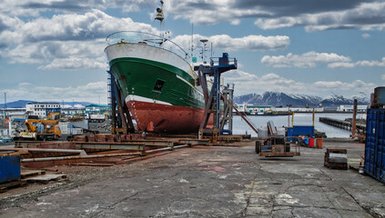 ship in dry dock, shipyard at the seaside, the fishing industry in Iceland