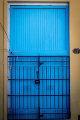 Architecture of Old Havana in Cuba. Everyday life with cars, houses and people.