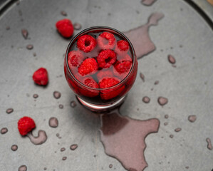 red rose petals in water