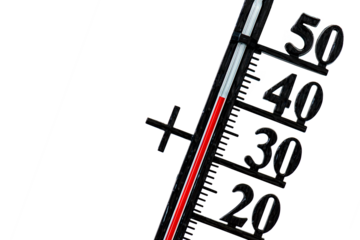 isolated thermometer with high temperature in summer heat