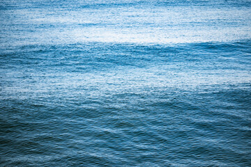 Obraz premium blue ocean surface background