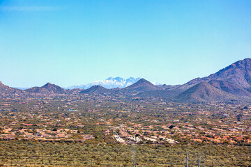 Snow dusted Four Peaks from above North Scottsdale, Arizona viewed west to east