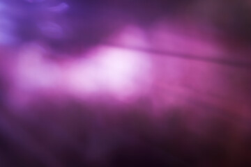 Defocused lights on violet, purple, magenta color cool tone, symbol of emotional of erotic and desire, Abstract light background 