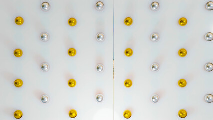 background of silver and gold spheres on a gray background. 3d render illustration