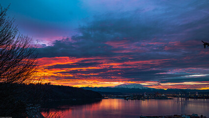 Fototapeta na wymiar Sunrise over Mt. Rainier and Port of Tacoma