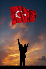 Father with son and the flag of Turkey