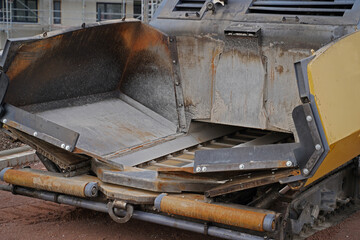 Asphalting of a new road on a construction site housing construc
