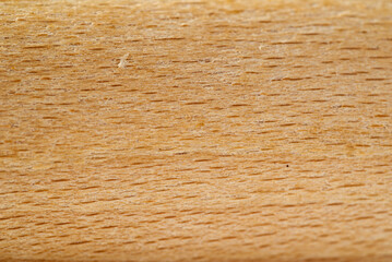 A close up of a wooden piece of wood with a yellow texture.