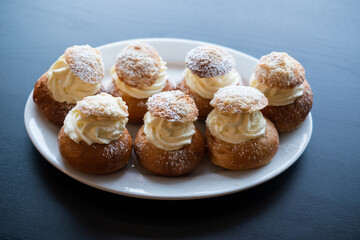 Semla bun is sweet cardamom bun filled with whipped cream and jam or almond paste. Made only in February during holidays. Shrove Tuesday or Vastlapäev or Fettisdagen tradirional food in Scandinavia.