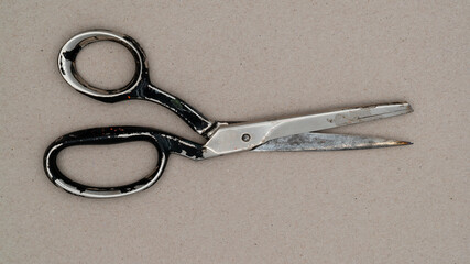Used old scissors. Top of view of an old scissor.