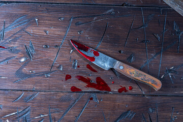 Knife in blood. Drops of blood and a knife. Cut with a knife. Cut yourself with a knife. Knife and...