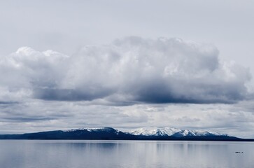 snowy mountains and dark cloud