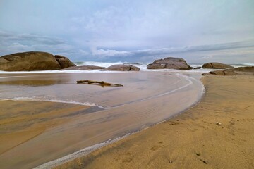 scenic view over the popular Kirinda Beach Sri Lanka with stormy sea in the evening