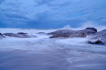 scenic view over the popular Kirinda Beach Sri Lanka with stormy sea in the evening
