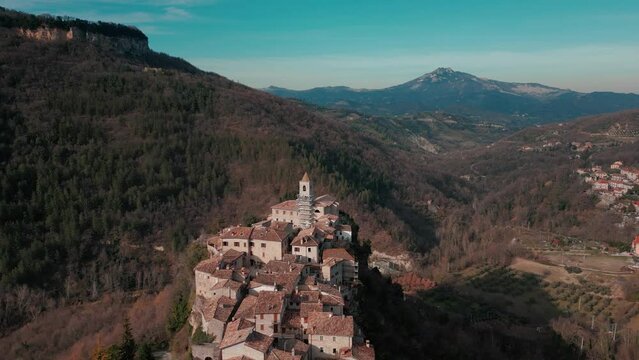 aerial view with drone of the medieval village of Castel Trosino with its dam, in the province of Acoli Piceno in the Marche region