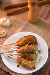 Sempol ayam (chicken sempol), Indonesian traditional food, made from chicken meat and tapioca flour, served with white plate.