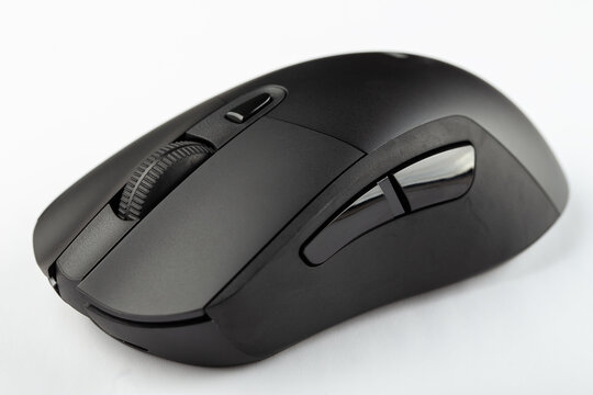 Black wireless computer mouse on a white background.