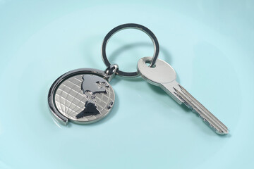 World symbol with silver keys on a blue background. Open world concept