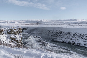 Icelandic frosty frozen close-up nearby a waterfall in winter time Gullfoss