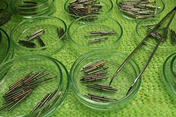A look into dentist shelf - sorted dental stomatology burs, both diamond and carbide heads of...